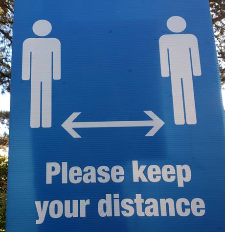 keep your distance blue sign 