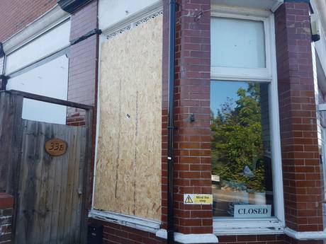 il picchio boarded up windowt